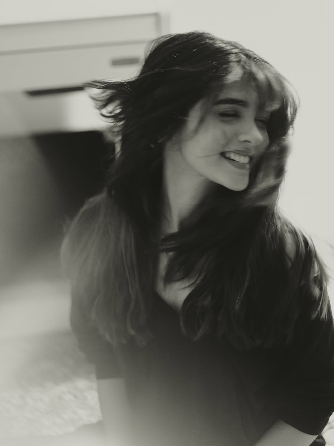 Pranali Rathod smiles in a black-and-white close-up