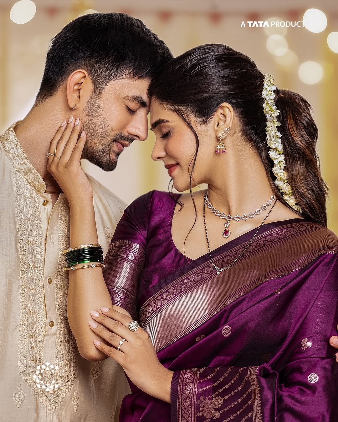 Pranali Rathod poses with a man wearing jewelry