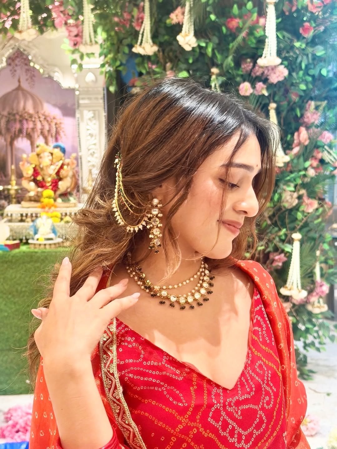 Rj Mahvash Mahvash poses in red traditional clothing with jewelry