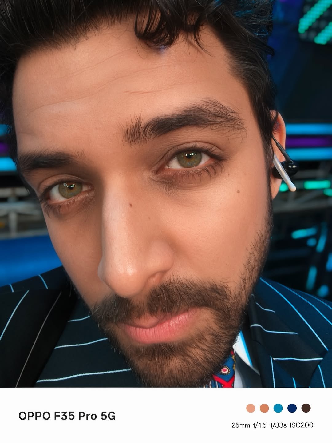 Samarth Jurel appears in a close-up wearing an earbud